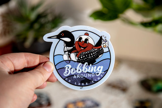 Bobbing Around on Lake Time Loon Sticker